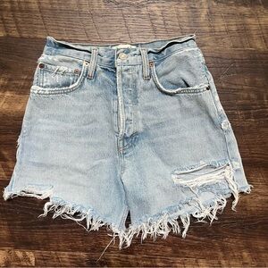 Agolde Riley long light wash distressed button fly denim jean cutoff shorts 24